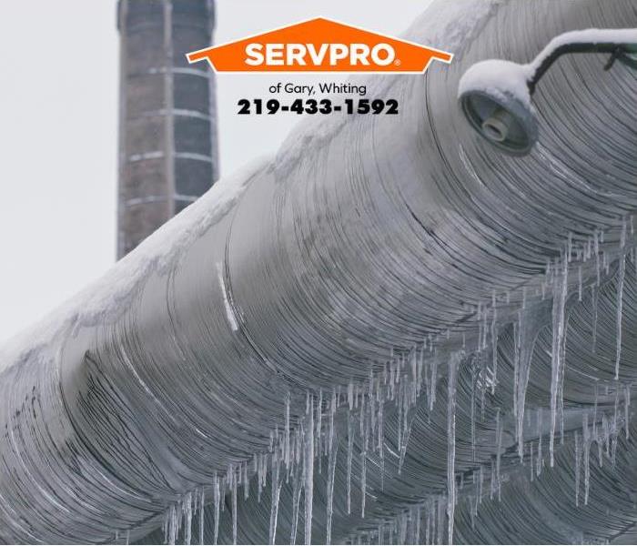 Icicles cling to heat pipes outside an industrial complex. 